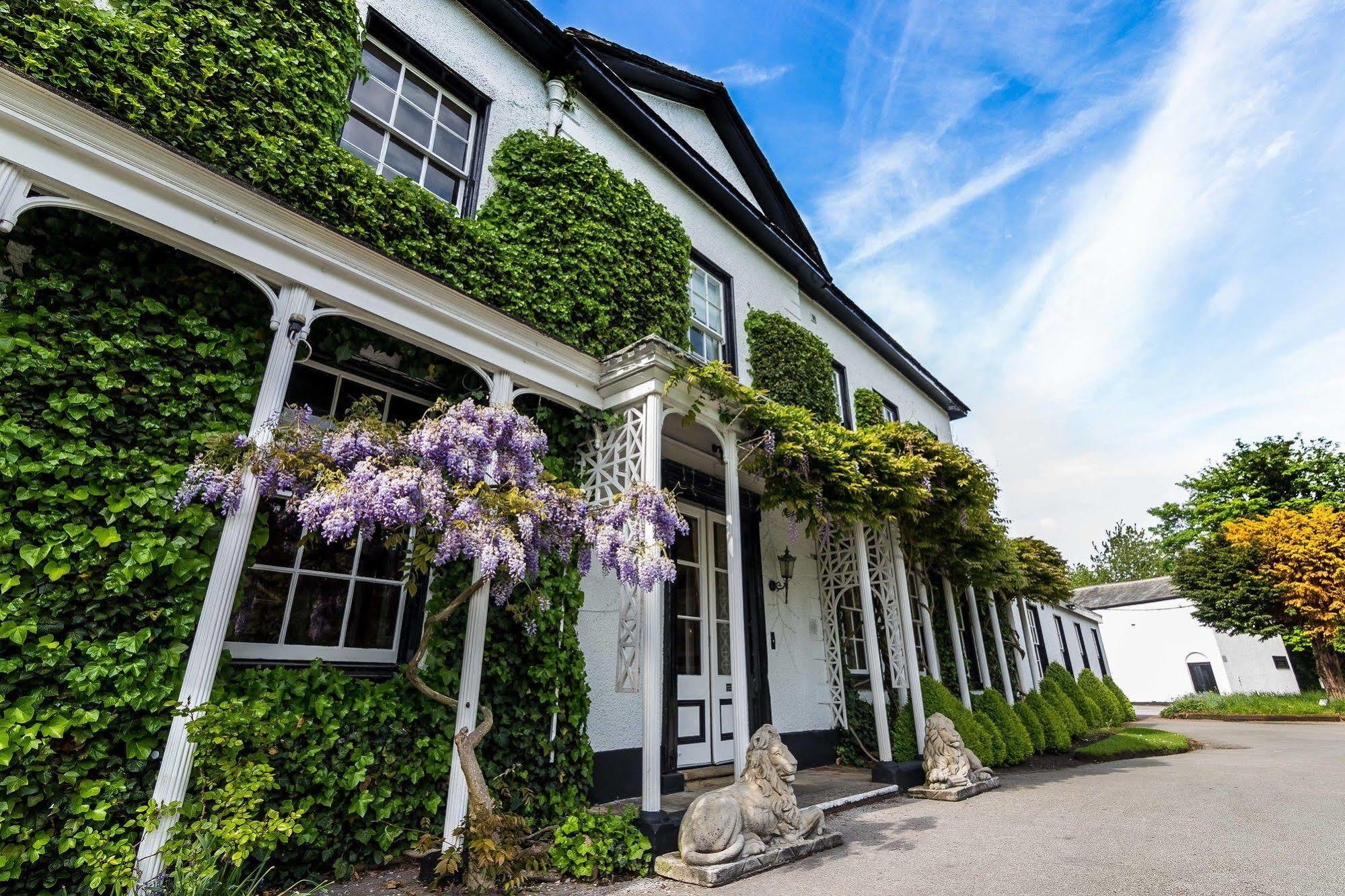 Statham Lodge Hotel Warrington Bagian luar foto